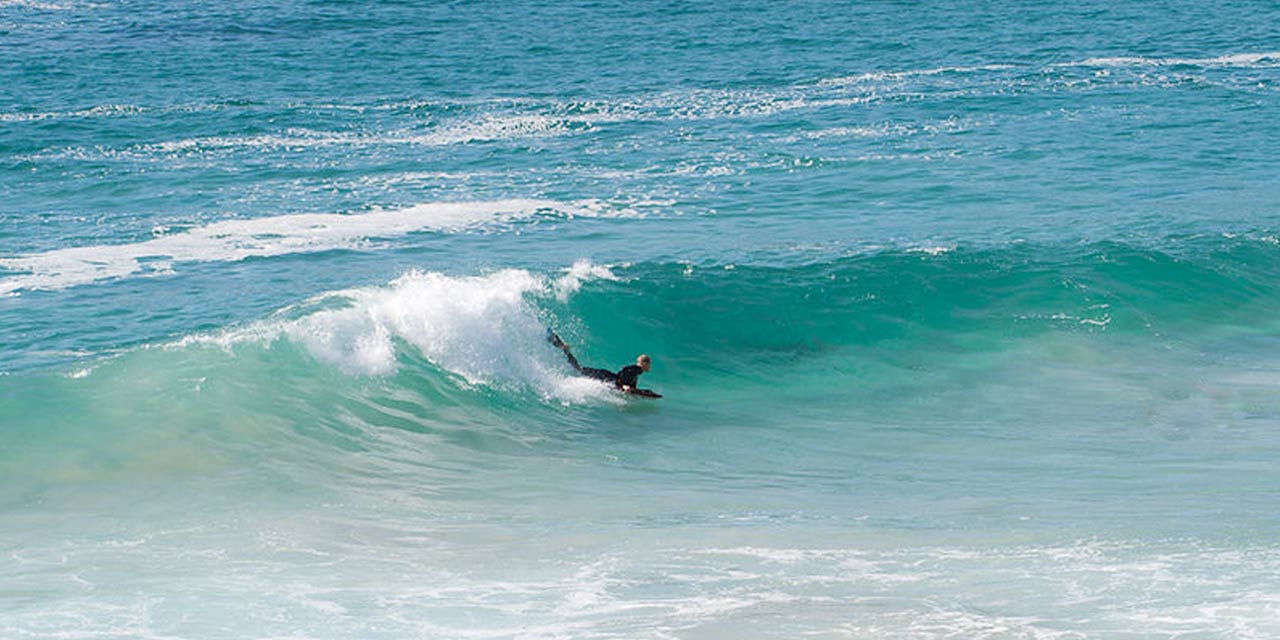 Thrill-seeker learning to surf in Gokarna's azure waters