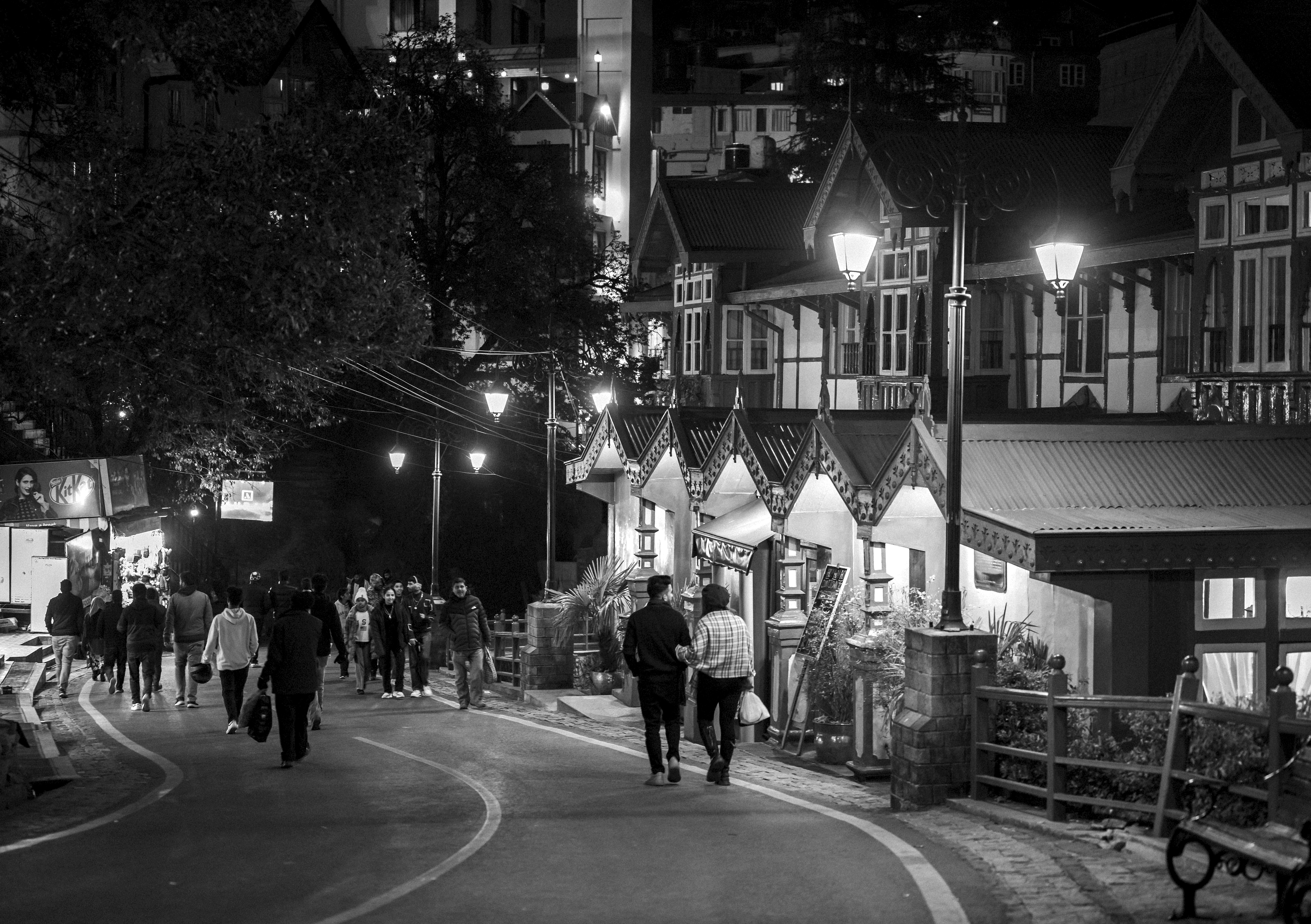 A couple walking along the Mall Road in Shimla. 
