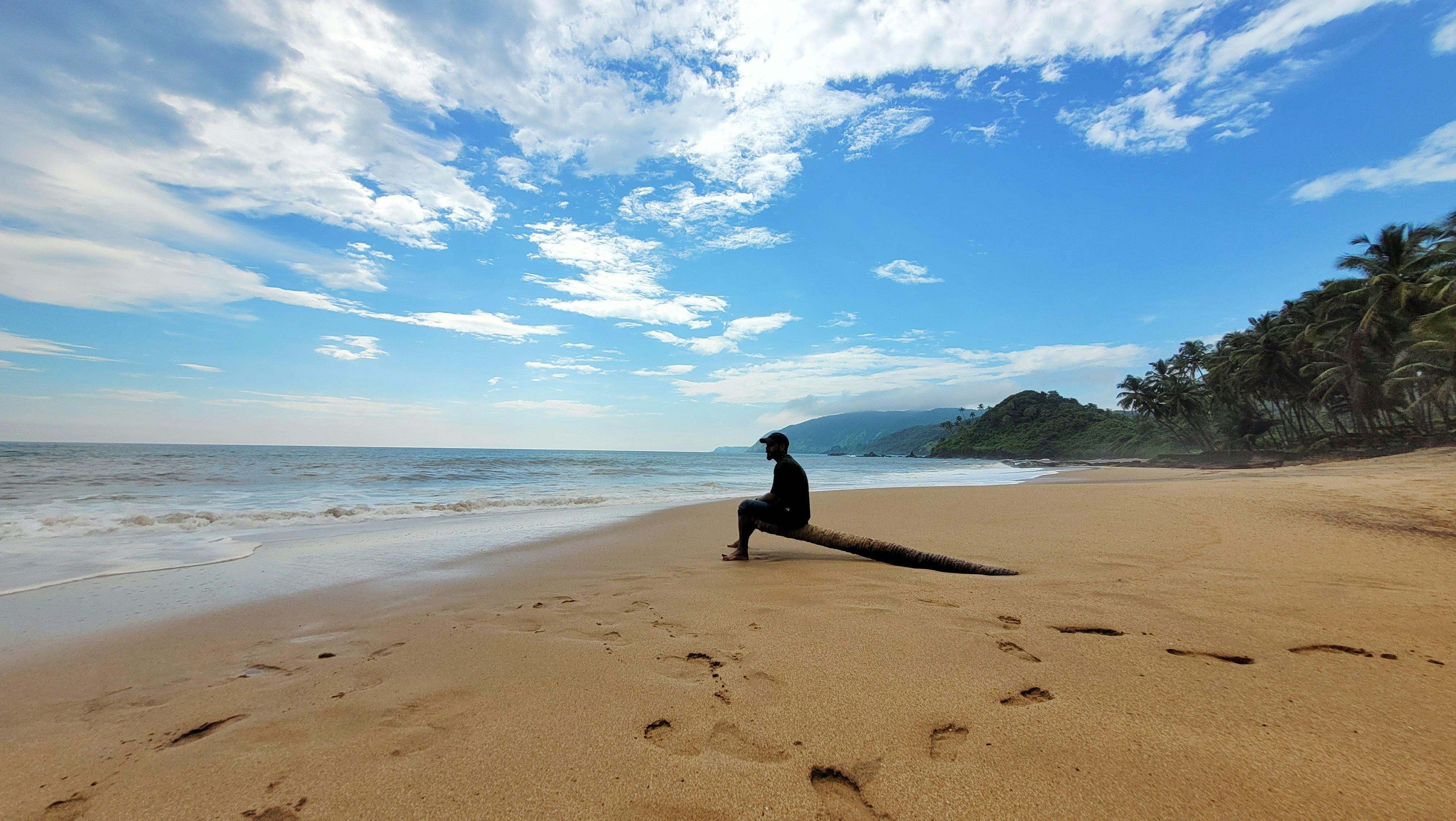 Man sitting on Goa beach