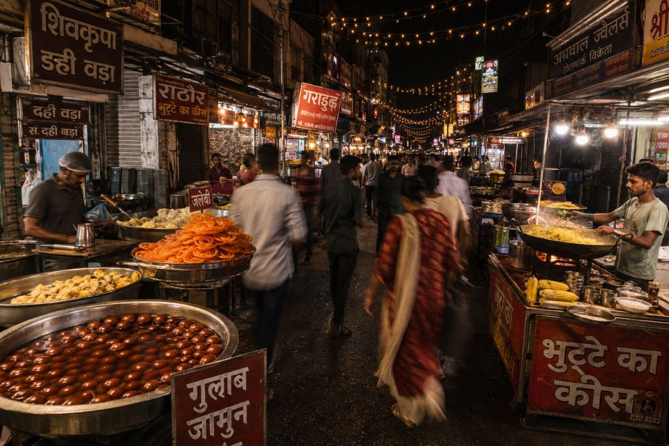 Sarafa Bazaar food stalls at night featuring lip smacking jalebis and gulab jamuns